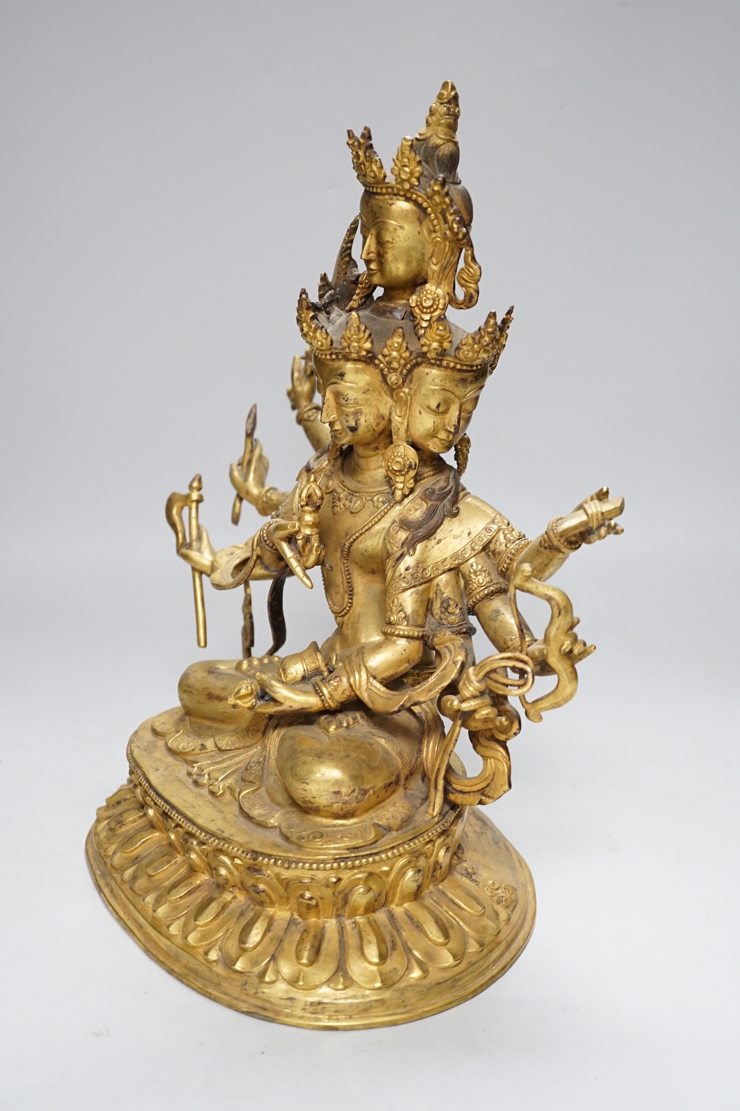 A Sino Tibetan gilt bronze figure of Avalokiteshvara, 34cm high